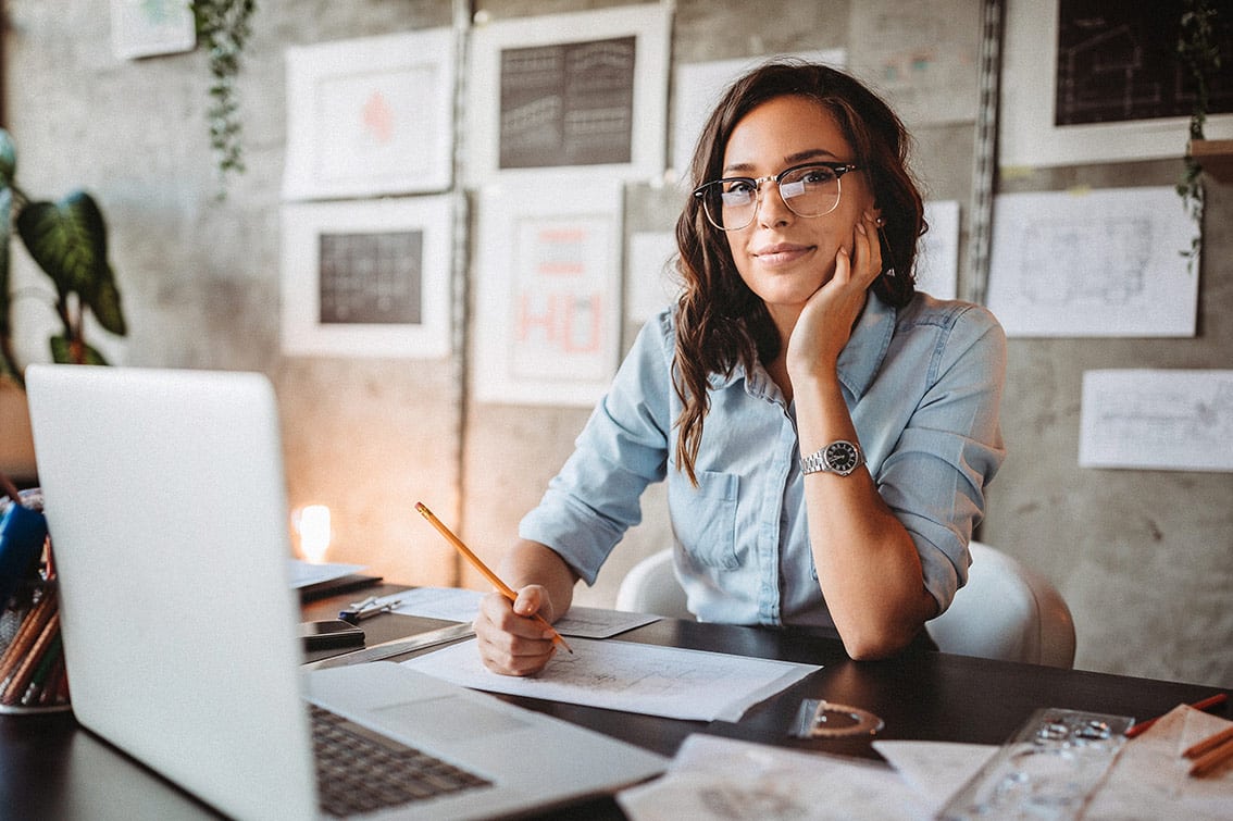 Female architect taking a break from work.